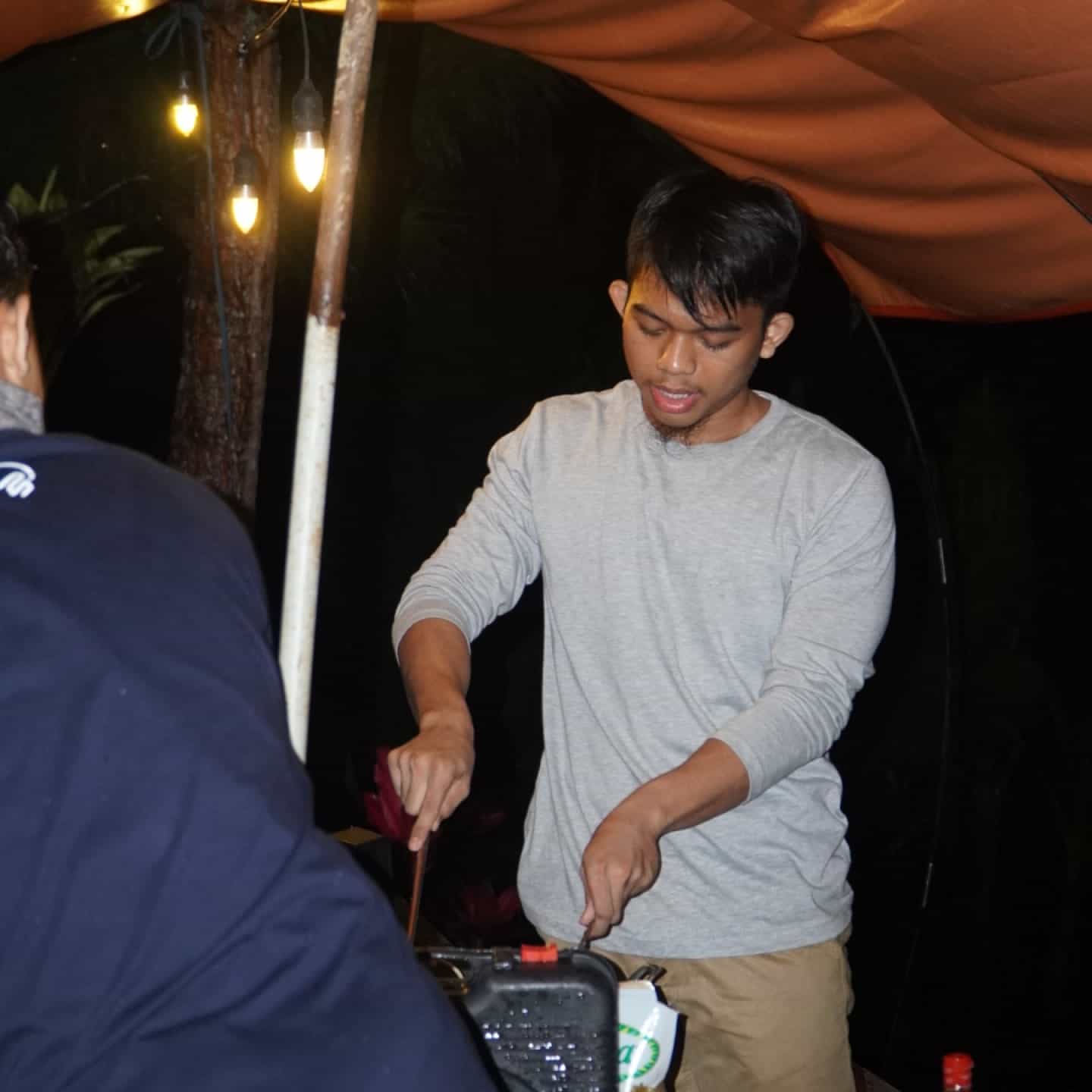 Syahrul cooking a meal